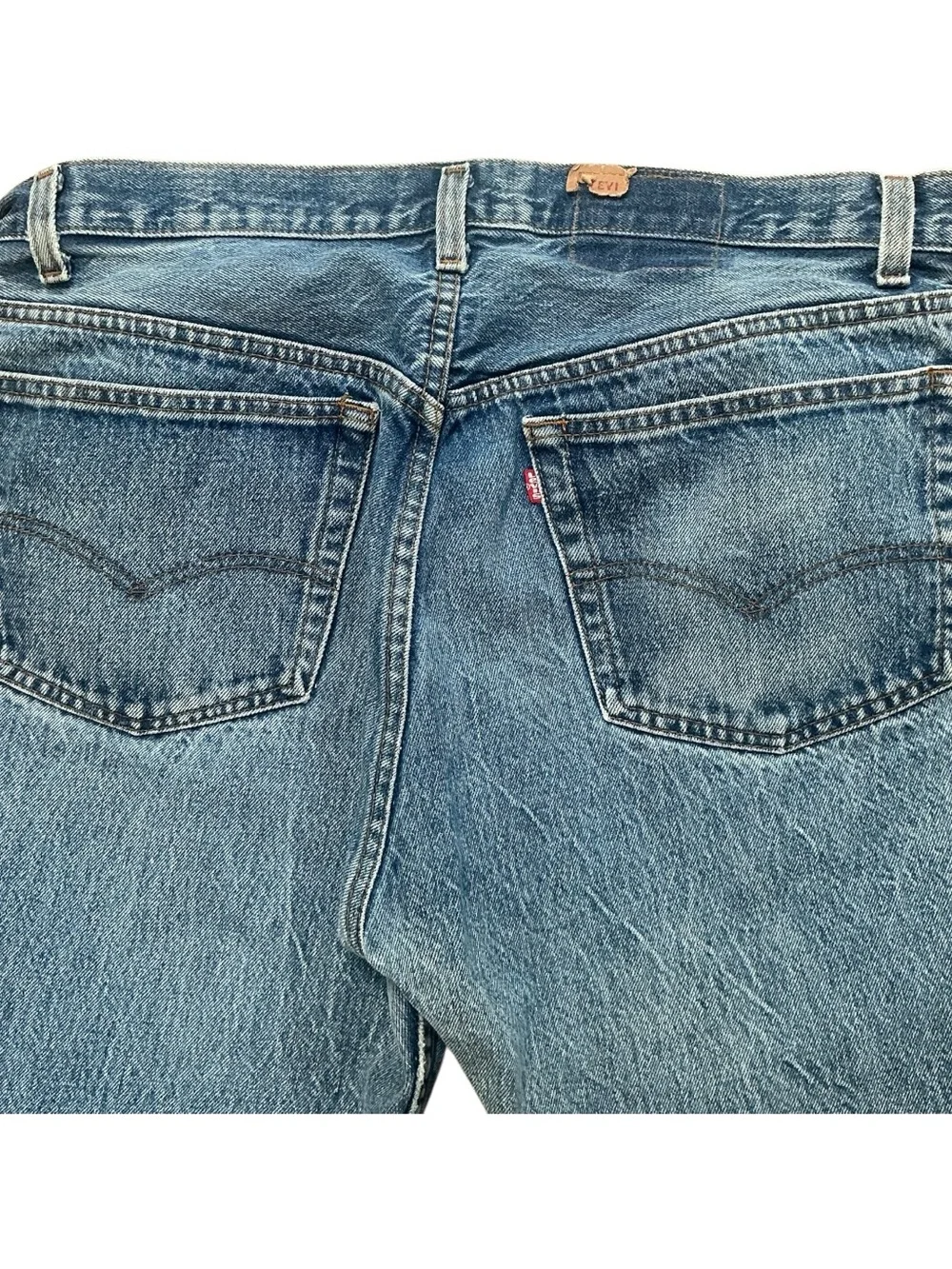Vintage Levi’s 501 medium wash straight leg jeans 34 x 29